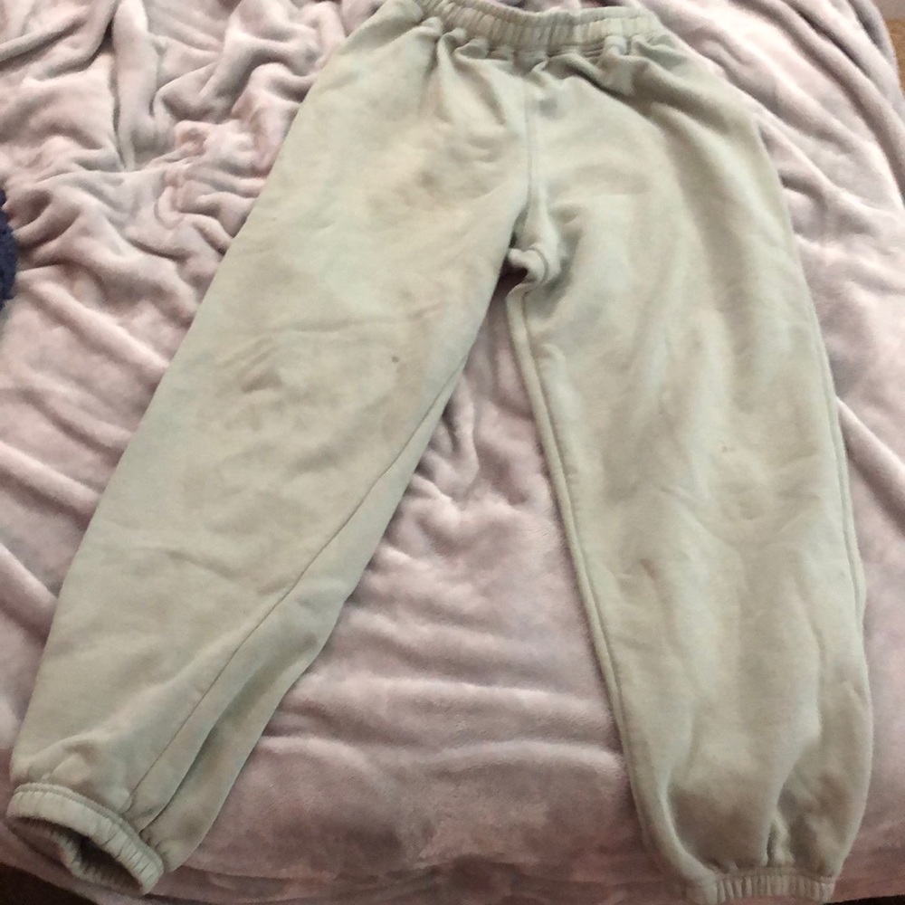 teal sweat pants, soft inside and smooth outside with baggy legs